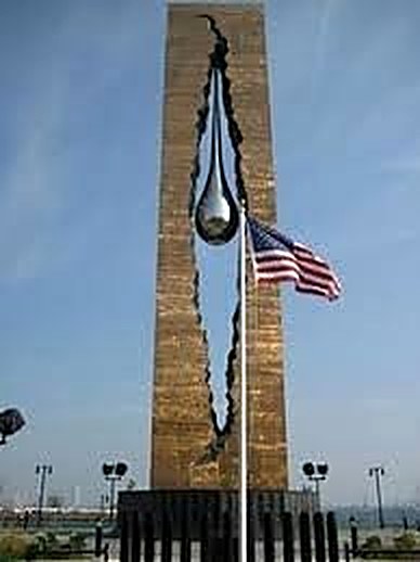 The monument beside the American flag